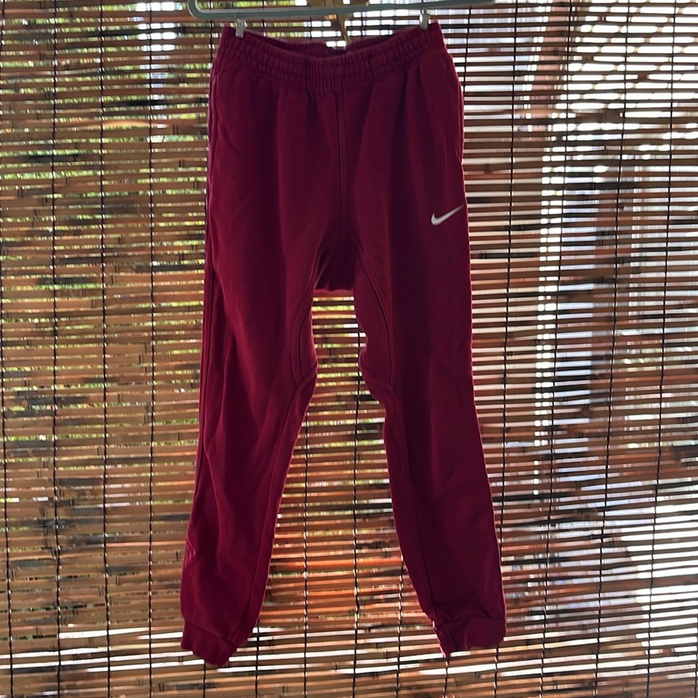 Red Nike jogger sweatpants. Size S